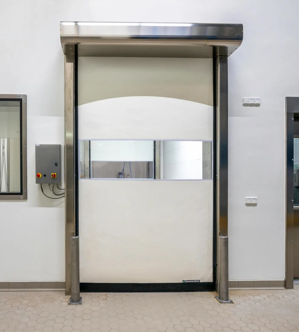 DynamicRoll CB 125 TM cleanroom high-speed door with a white curtain and stainless frame
