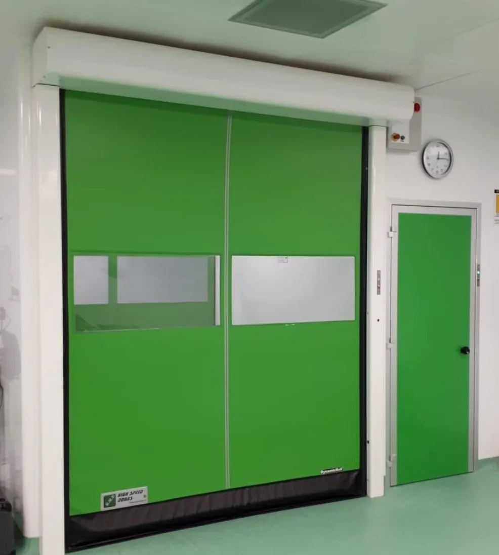 DynamicRoll CB 125 TM with a green curtain and vision strips in a cleanroom corridor