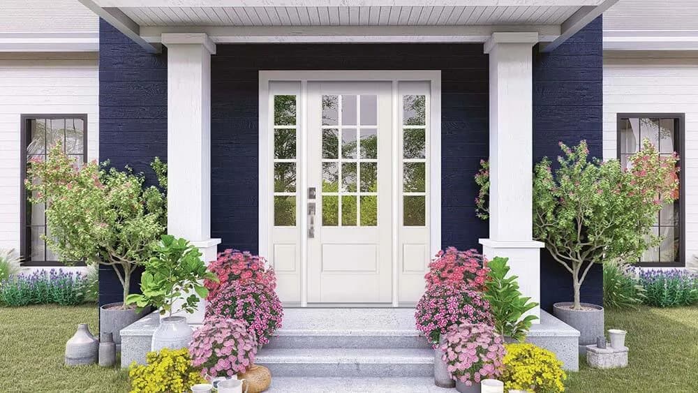 A white double entry door with divided-lite glass and matching sidelites on a covered porch