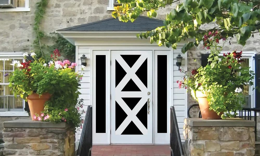A white flush glazed door with an X-pattern grille over dark glass and sidelites